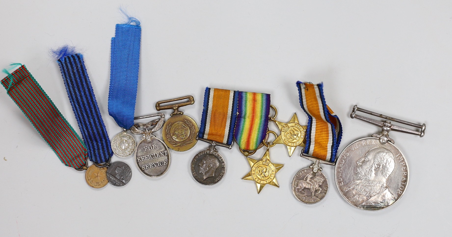 A group of British and Italian military miniature medals